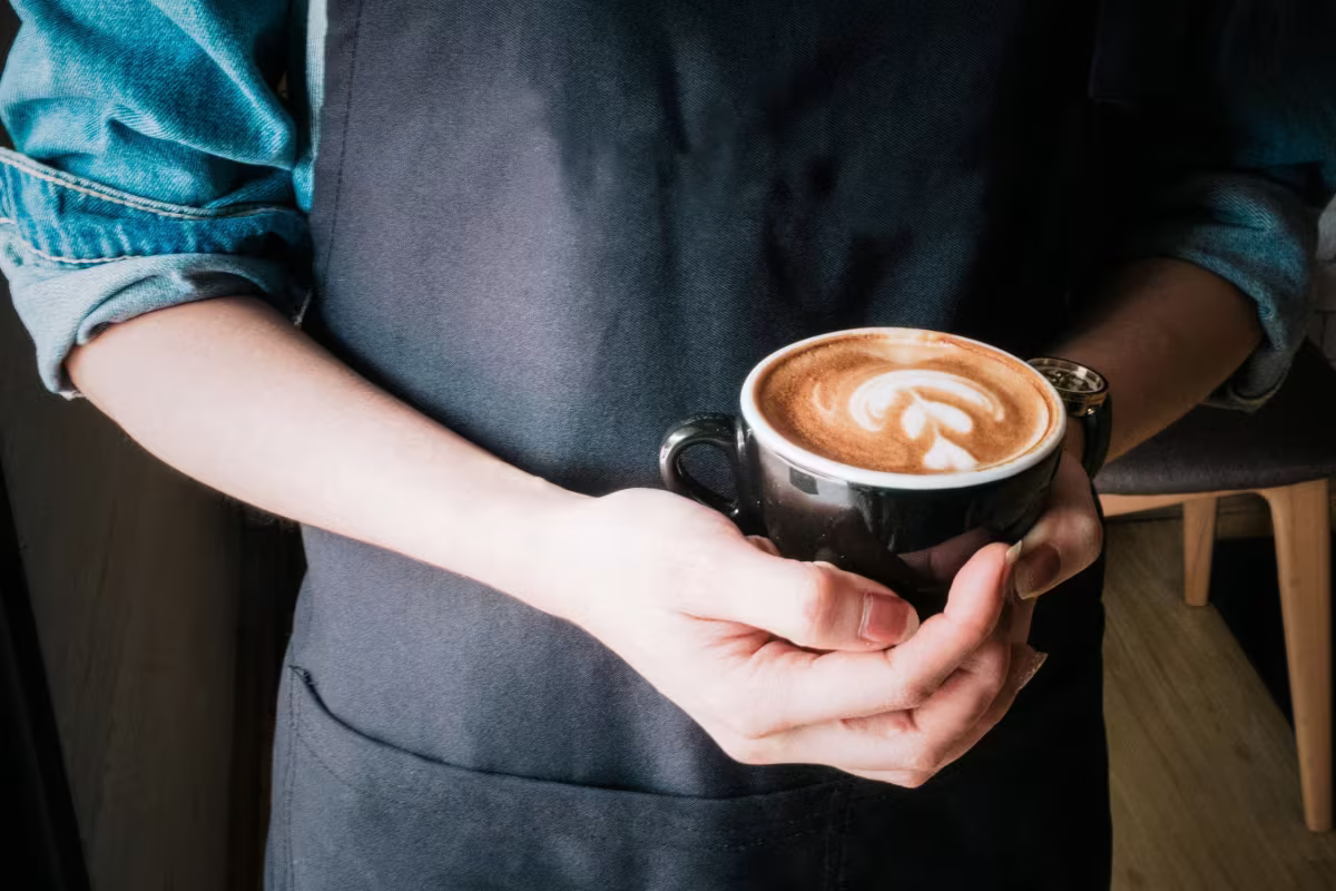 Barista showing an espresso