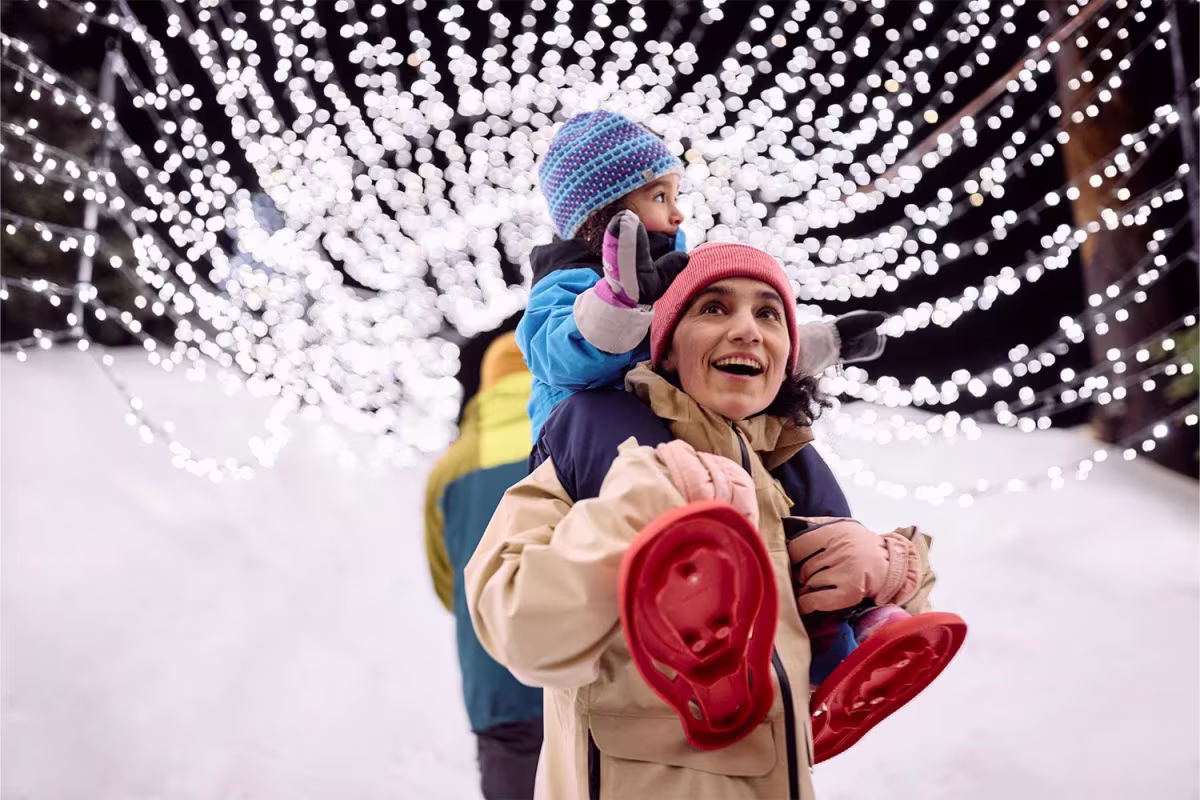 A woman and a kid enjoying themselves at Light Walk
